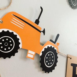 orange and black tractor age bannertractor age banner available in various colors to suit your party needs