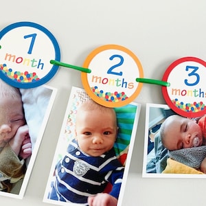 Let's have a ball first birthday milestones photo banner