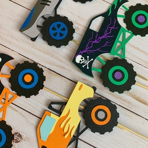 monster jam inspired truck cutouts that include grave digger, megladon, el toro loco, tornado and dragon