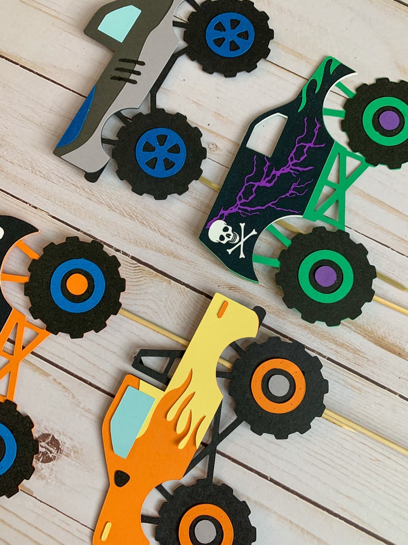 monster jam inspired truck cutouts that include grave digger, megladon, el toro loco, tornado and dragon