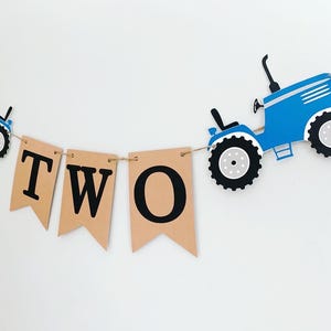 tractor age banner available in various colors to suit your party needs