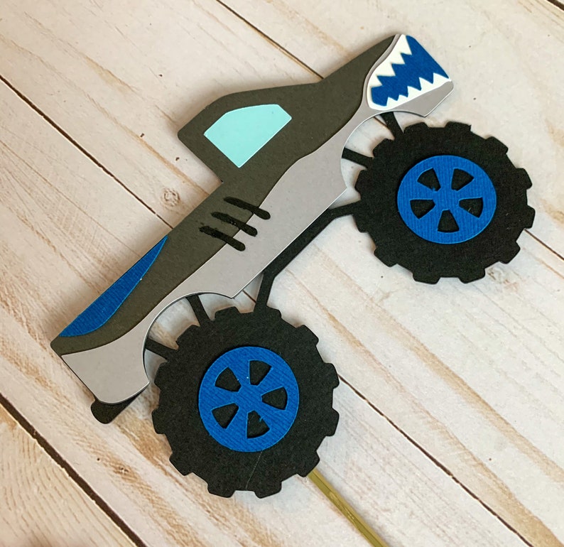monster jam inspired truck cutouts that include grave digger, megladon, el toro loco, tornado and dragon