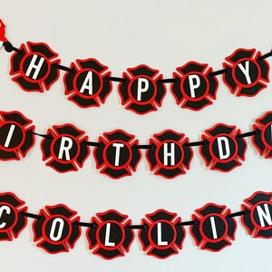May include: Firefighter themed birthday banner with red and black fire hydrant shapes. The banner reads "Happy Birthday Collin".