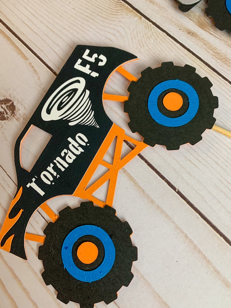 monster jam inspired truck cutouts that include grave digger, megladon, el toro loco, tornado and dragon