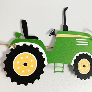 tractor age banner available in various colors to suit your party needs