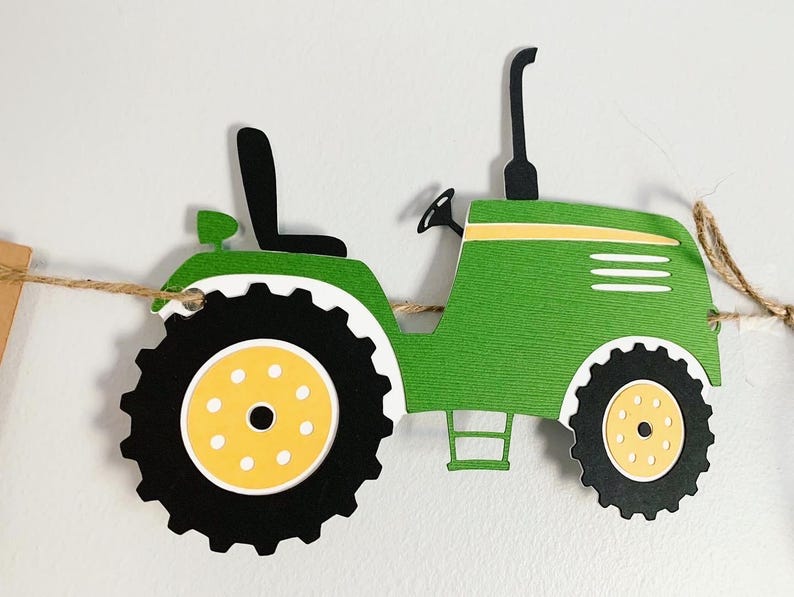 tractor age banner available in various colors to suit your party needs