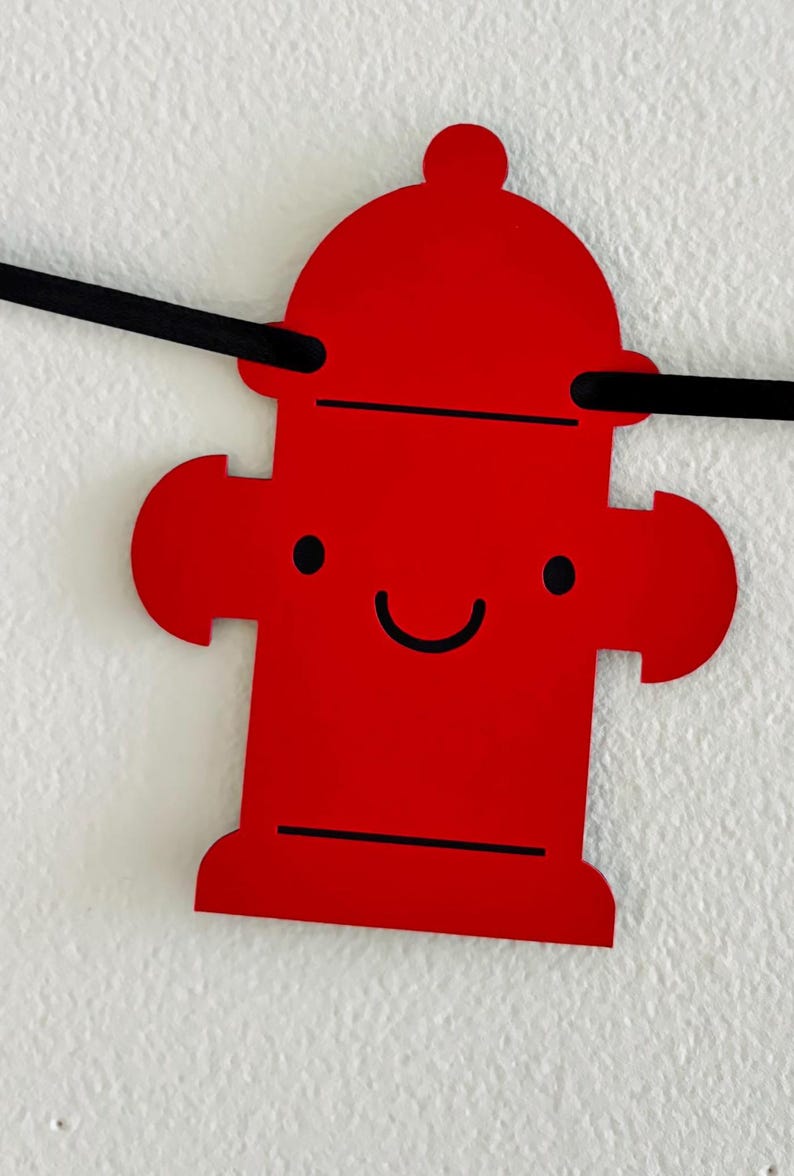 firetruck party decorations featuring firetruck, fire hydrant, fire extinguisher, flame and dalmatian