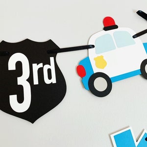 first responders emergency vehicle happy birthday banner featuring police car and badges, EMT ambulance and emblem, firetruck and fire emblem