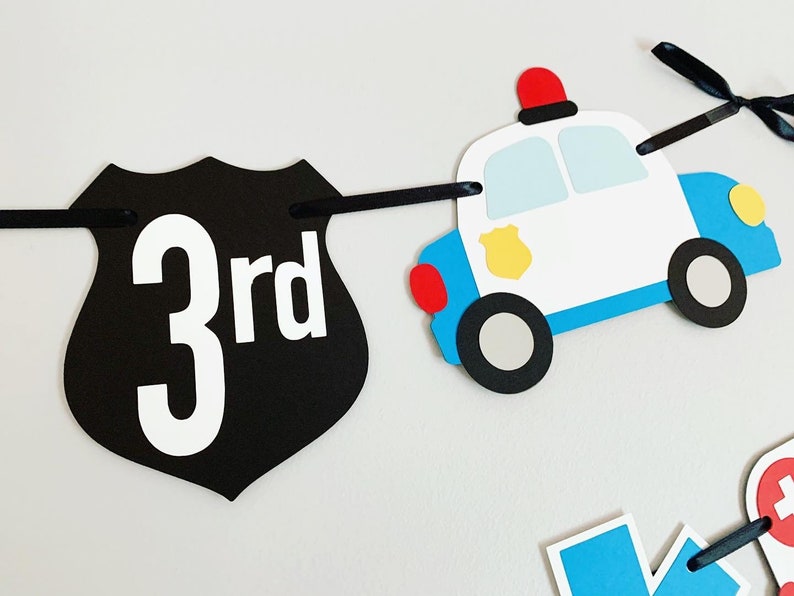 first responders emergency vehicle happy birthday banner featuring police car and badges, EMT ambulance and emblem, firetruck and fire emblem