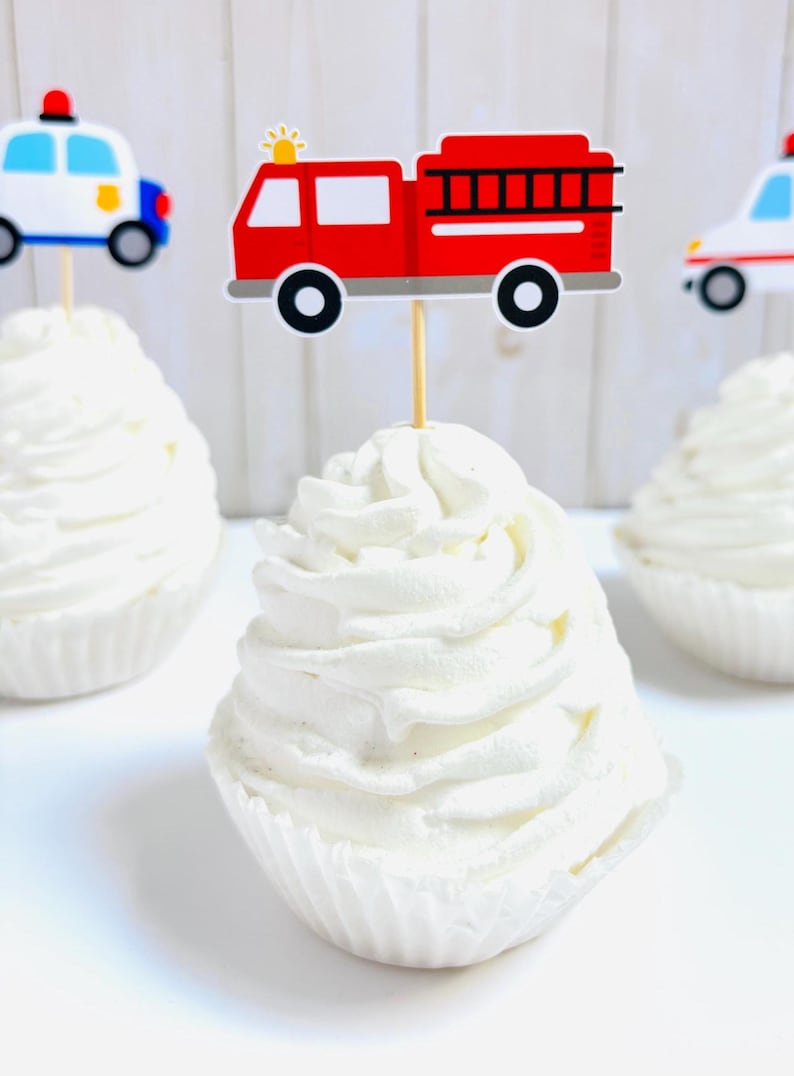 emergency vehicles cupcake toppers that include firetrucks, ambulances and police cars
