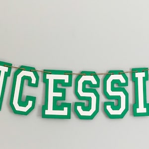 football concessions banner featuring varsity letters and two footballs that will be perfect for your little one's football themed birthday party, super bowl game day party, sports team party or to hang on your schools concession stand during football season. The banner is fully customizable.