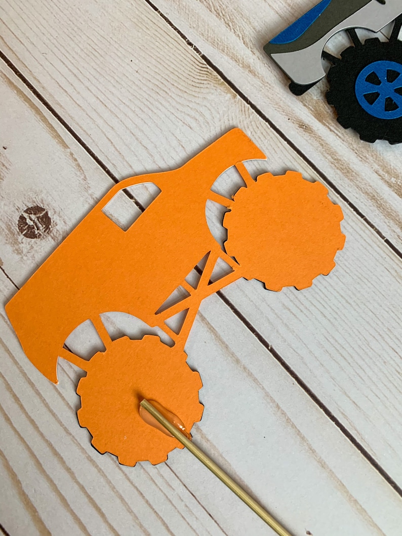 monster jam inspired truck cutouts that include grave digger, megladon, el toro loco, tornado and dragon