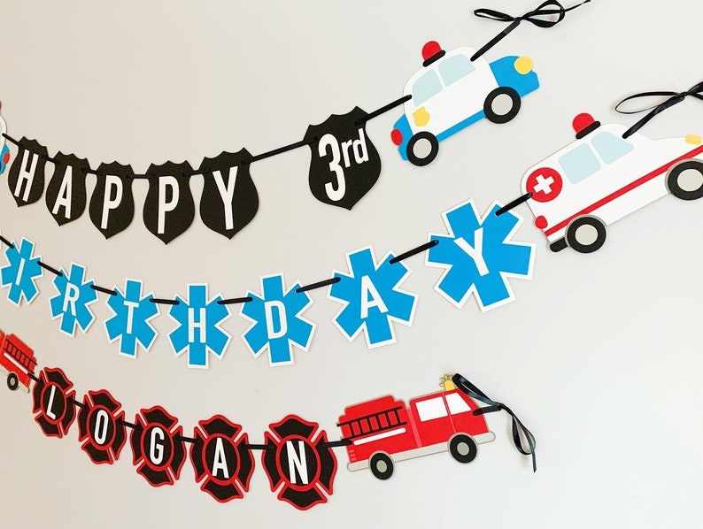 first responders emergency vehicle happy birthday banner featuring police car and badges, EMT ambulance and emblem, firetruck and fire emblem