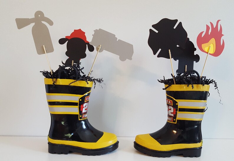 firefighter centerpiece birthday decorations featuring a firetruck, emblem with age, flame, fire hydrant, dalmatian and fire extinguisher