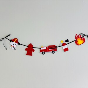 firetruck party decorations featuring firetruck, fire hydrant, fire extinguisher, flame and dalmatian