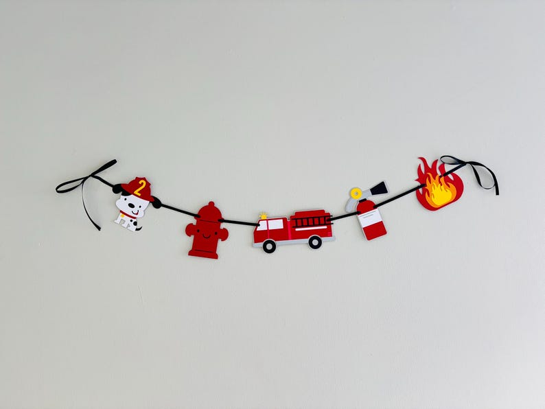 firetruck party decorations featuring firetruck, fire hydrant, fire extinguisher, flame and dalmatian