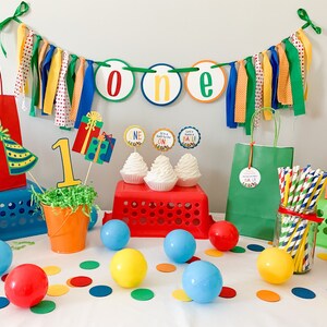 Let's have a ball, It's a ball to be one high chair banner featuring primary colors