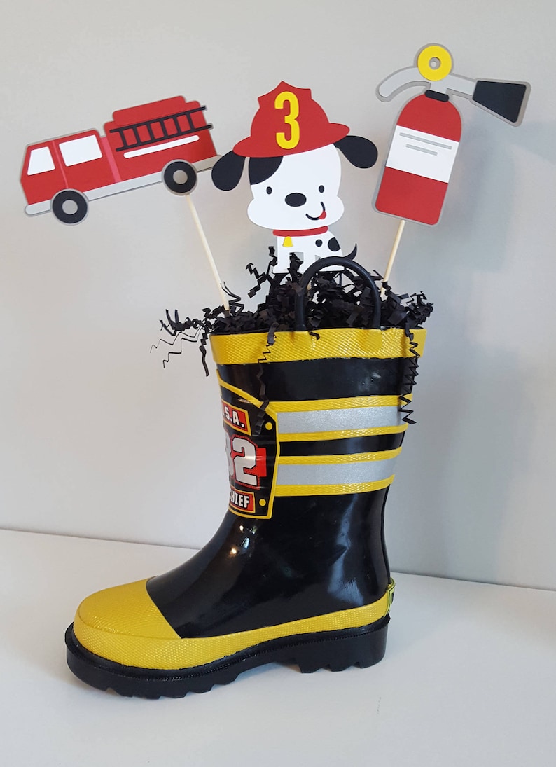 firefighter centerpiece birthday decorations featuring a firetruck, emblem with age, flame, fire hydrant, dalmatian and fire extinguisher