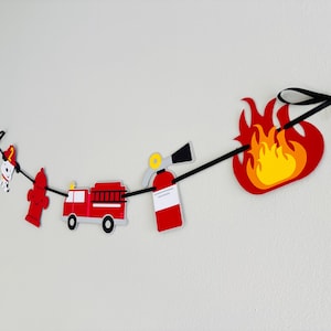 firetruck party decorations featuring firetruck, fire hydrant, fire extinguisher, flame and dalmatian
