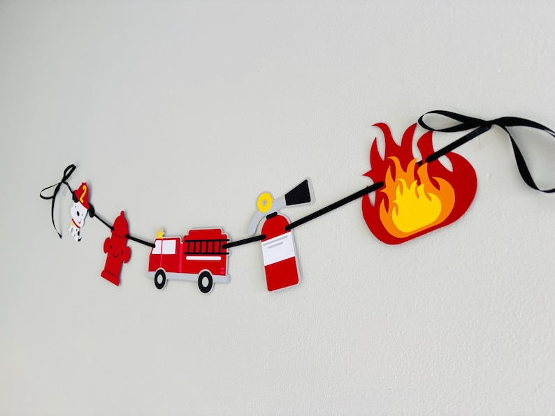 firetruck party decorations featuring firetruck, fire hydrant, fire extinguisher, flame and dalmatian