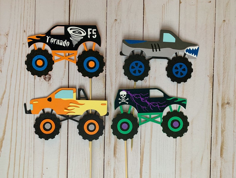 monster jam inspired truck cutouts that include grave digger, megladon, el toro loco, tornado and dragon