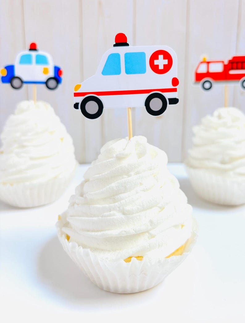 emergency vehicles cupcake toppers that include firetrucks, ambulances and police cars
