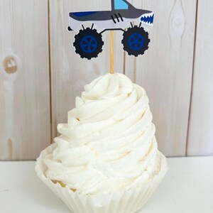 monster jam monster truck cupcake toppers featuring grave digger, el toro loco, megalodon, dragon and tornado