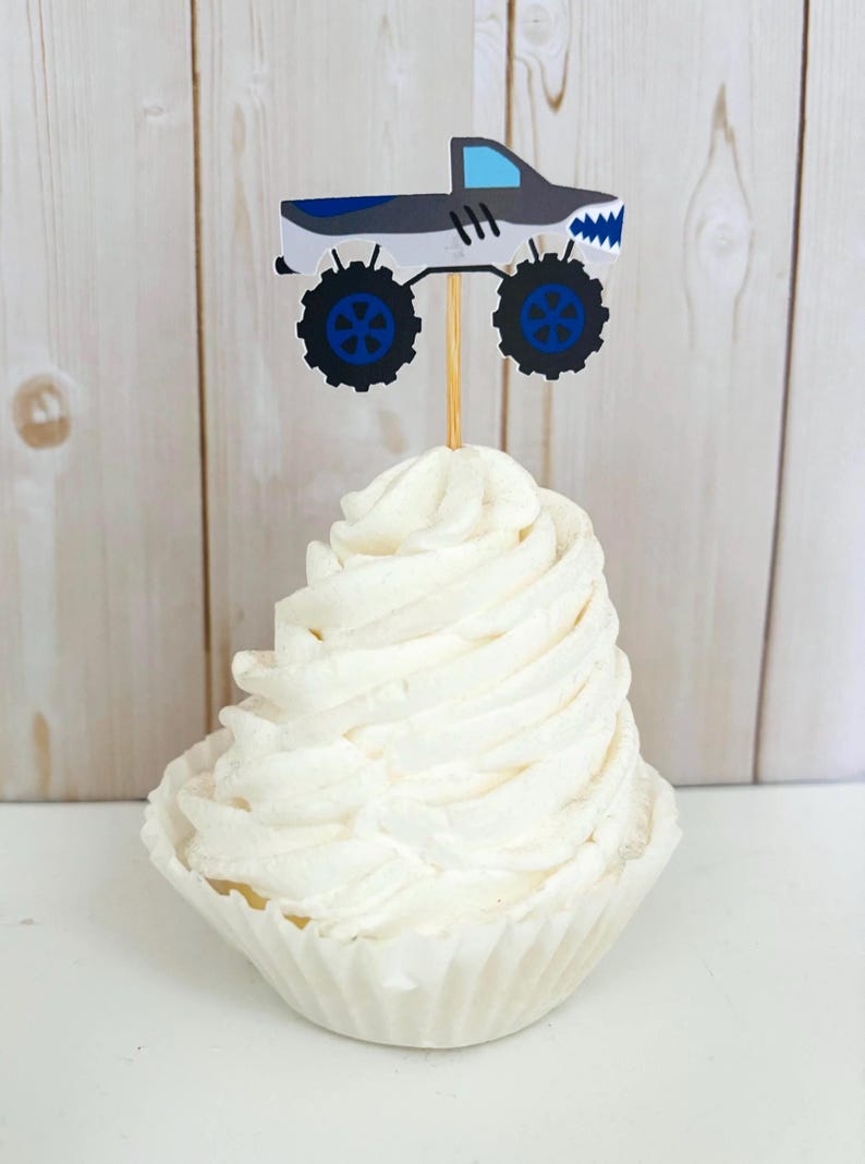 monster jam monster truck cupcake toppers featuring grave digger, el toro loco, megalodon, dragon and tornado
