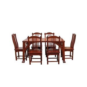 May include: A wooden dining set featuring a rectangular table and six chairs. The table and chairs are a rich, dark brown color. The chairs have vertical back slats and the table has decorative carvings on the legs.