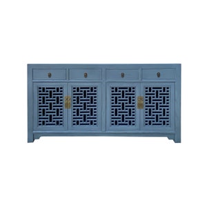 May include: A light blue wooden sideboard with four doors and three drawers. The doors have a lattice design and brass hardware.
