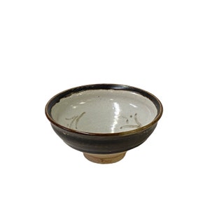 a black-brown-beige-graphic-ceramic-bowl-art