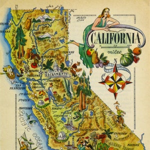 May include: A colorful illustrated map of California with a woman in a green dress standing on the top right corner. The map shows major cities, landmarks, and geographic features. The text "California" is written in a large, decorative font. A compass rose is in the center of the map.