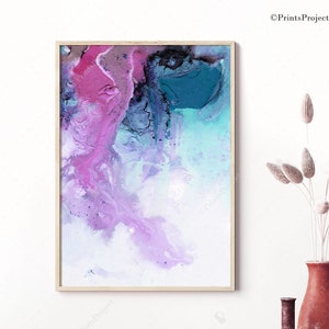 May include: Abstract painting in shades of pink, blue, and white in a wooden frame. The painting is hanging on a white wall above a table with a vase of dried flowers and two decorative vases.