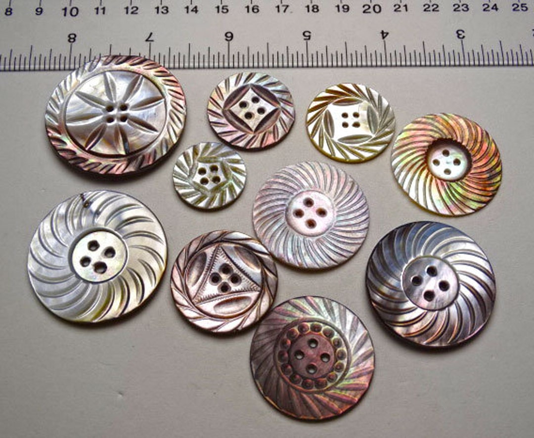 Choice of 3 Groups of Large Antique Hand Carved Iridescent Pinwheel ...