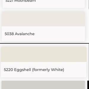 May include: A color palette chart featuring four rectangular swatches with labels: 5221 Moonbeam, 5038 Avalanche, 5220 Eggshell (formerly White), and 5077 Frost. Each swatch displays a distinct shade of off-white, cream, or light gray color.