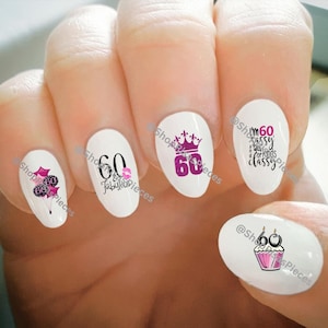 May include: Set of six nail decals with pink and black designs. The designs include the number 60, a crown, balloons, a cupcake, and the text "I'm 60 and sassy all kinds of classy".