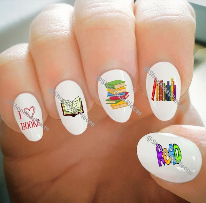 May include: Nail art stickers with a book theme. The stickers feature a stack of books, a single open book, a heart with the words "I love books", and the word "Read" in colorful letters.