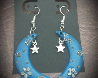 Celestial blue and silver moons with stars