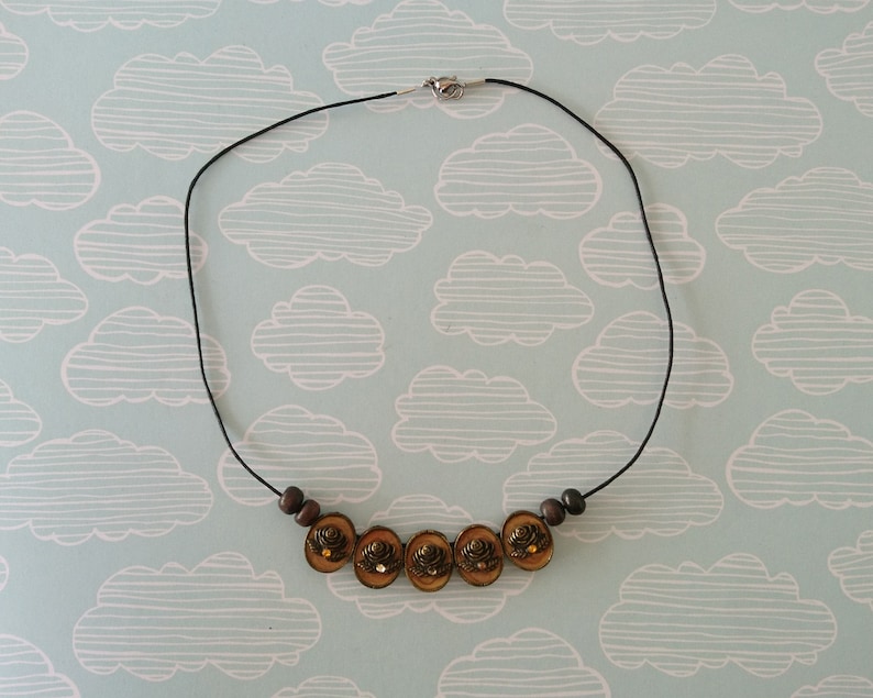 cameo floral pendant necklace simple beaded jewellery made with reclaimed materials statement necklace