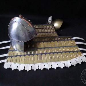 Byzantine set; helmet, pauldrons, cuirass. Klibanion. and forged steel, brass & copper. Reenactment.