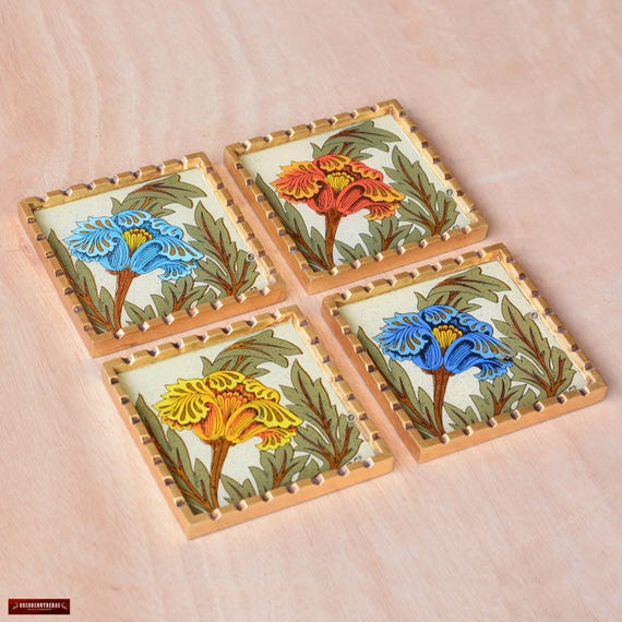 Hand-painted Peruvian glass floral tiles turned into coasters — artisan technique you genuinely won't find at Target.