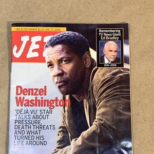 May include: A magazine cover featuring Denzel Washington, the star of the movie 'Deja Vu'. The cover text reads 'Denzel Washington' and 'Deja Vu' star talks about pressure, death threats and what turned his life around'. The magazine is Jet, and the cover date is November 27, 2006.