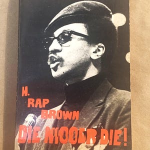 May include: Book cover featuring a black and white photo of H. Rap Brown speaking into a microphone. The title "Die Nigger Die!" is in large red letters. The cover also includes the price.
