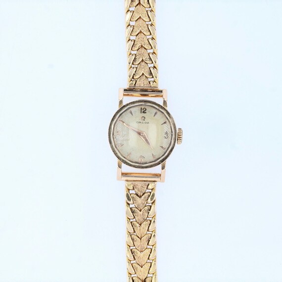 Omega gouden dameshorloge met gouden band sale