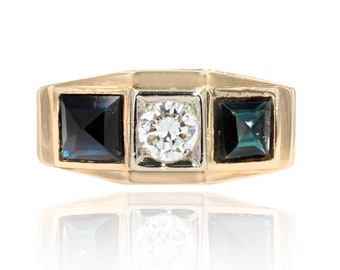 Art deco kousenbandring met saffier en diamant