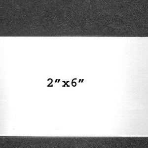 May include: A 2 inch by 6 inch blank metal plate. The plate is silver and has a brushed finish.