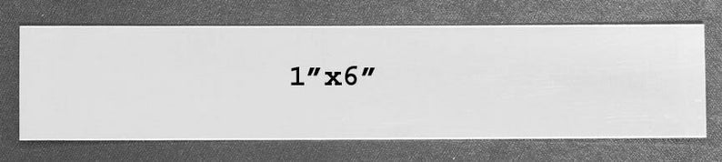 May include: White rectangular label with the text "1" inch by "6" inches printed in black.