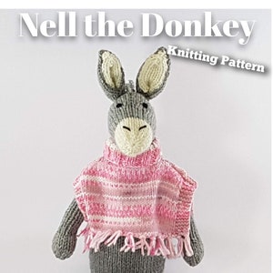 May include: Knitting pattern for a gray and white donkey wearing a pink and white striped sweater with a fringe. The pattern is titled "Nell the Donkey Knitting Pattern".