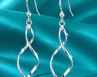 Pendientes colgantes de plata de ley con diseño en espiral, joyería ligera con forma de gota retorcida.