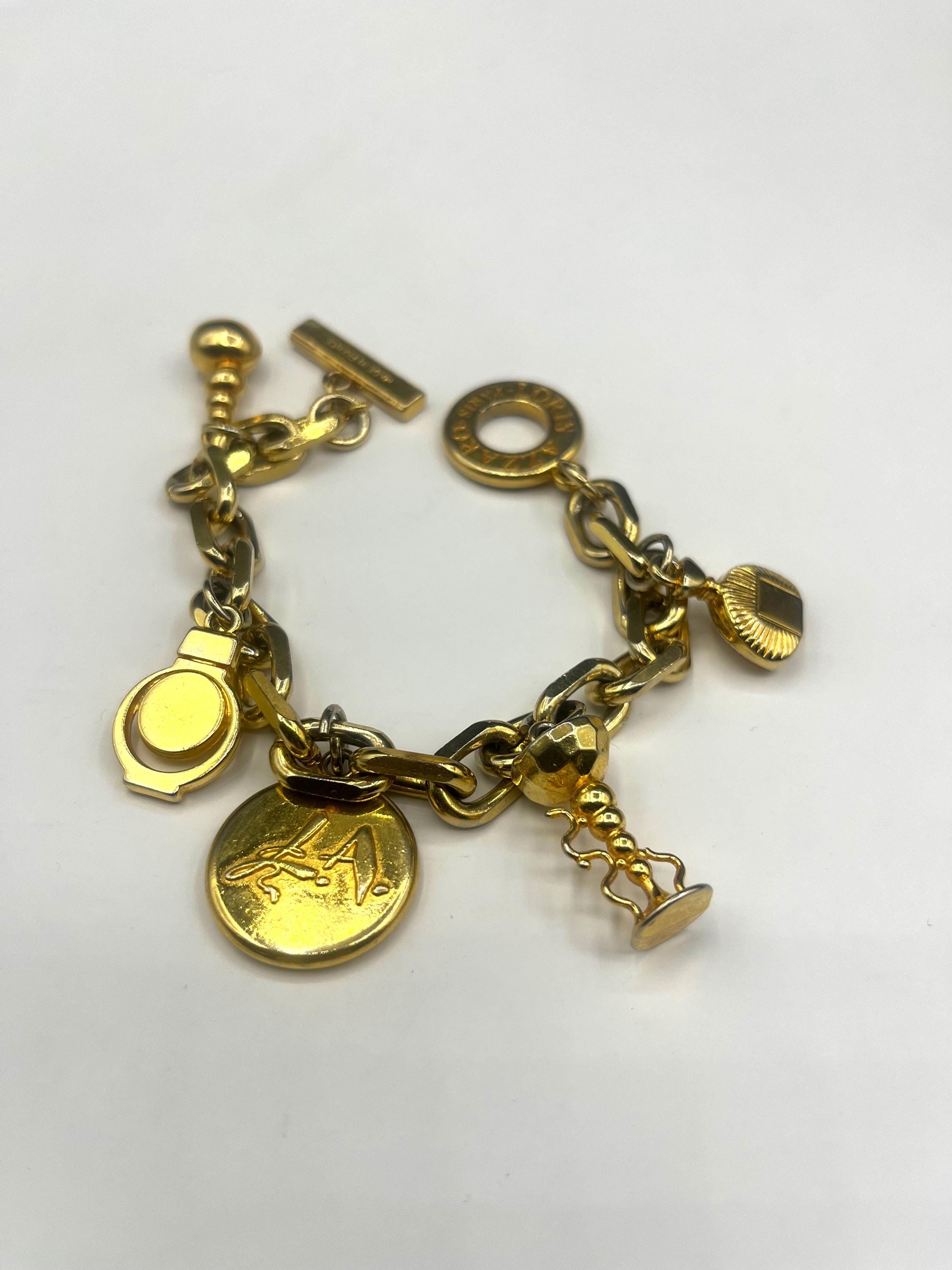 Bracelet Fantaisie Vintage YSL - Noir Et Argenté Avec Logo - Matériau Métal Et Simili Cuir - Occasion Très Bon état